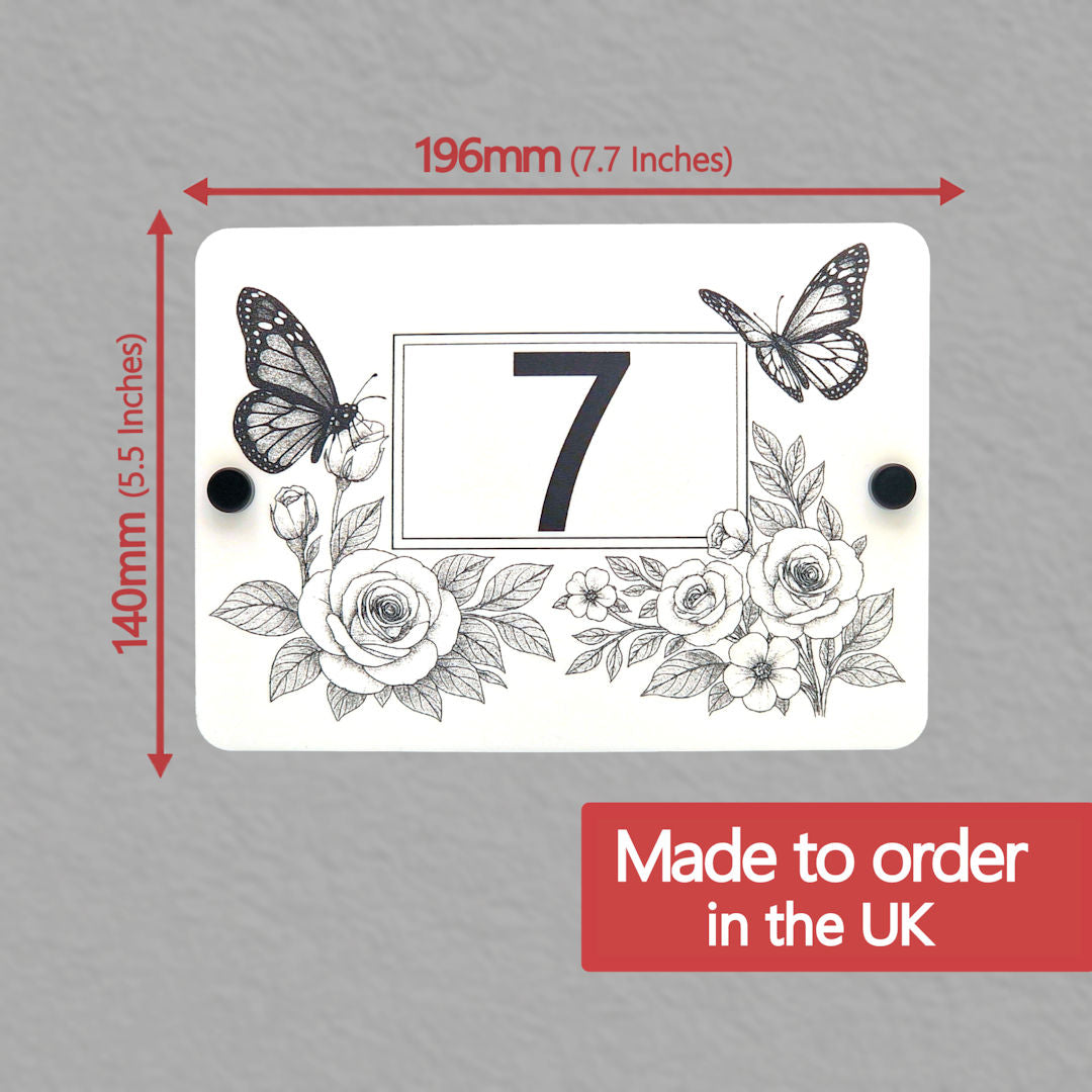 Decorative house number sign with butterflies and flowers, shown with dimensions on a grey background - size chart