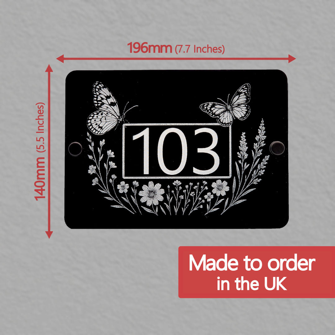 House number sign with butterflies and flowers, showing dimensions and Made to order in the UK