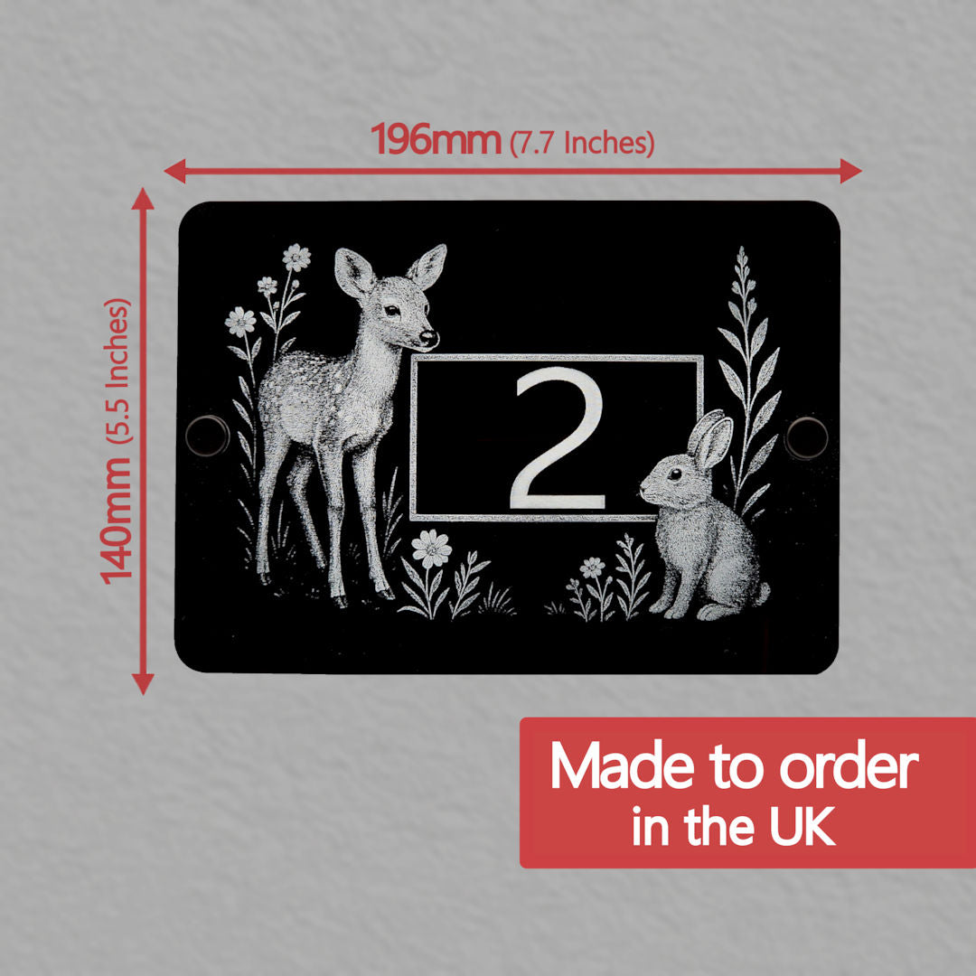 Decorative house number sign with a deer and rabbit illustration and measurements on a grey background.
