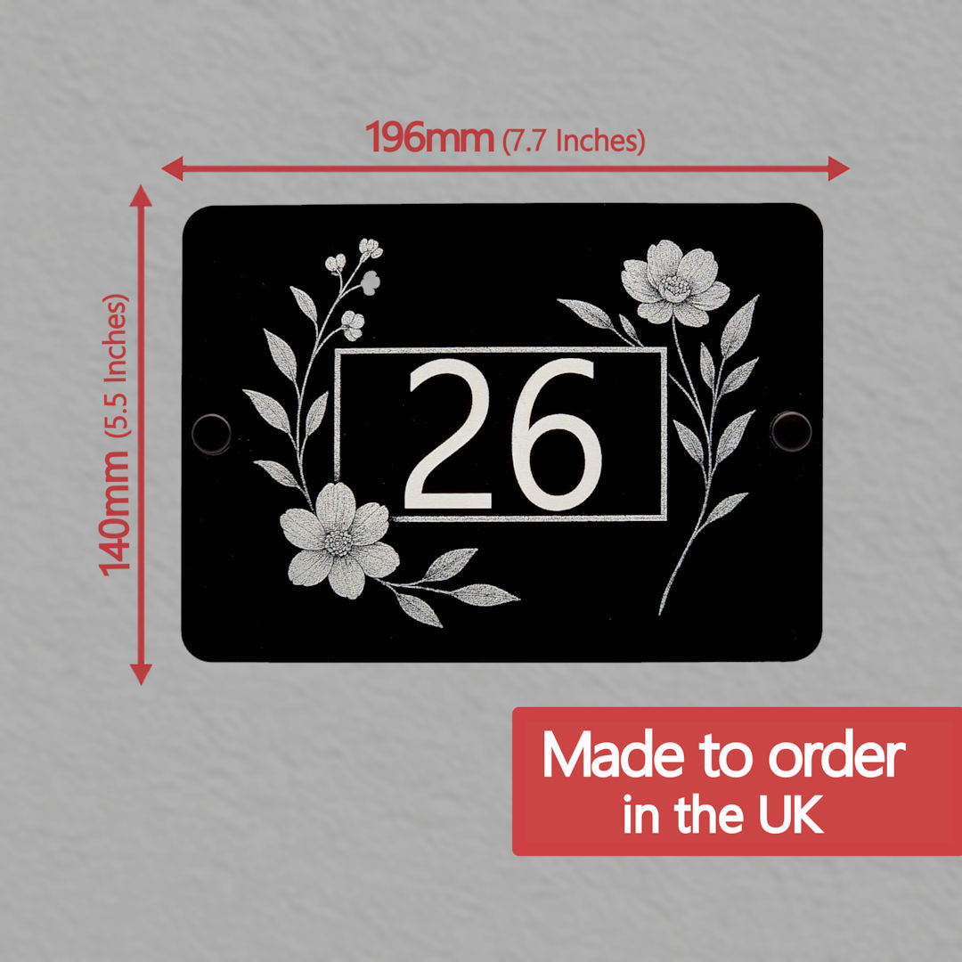 House number sign with floral side bloom design and measurements on a grey background