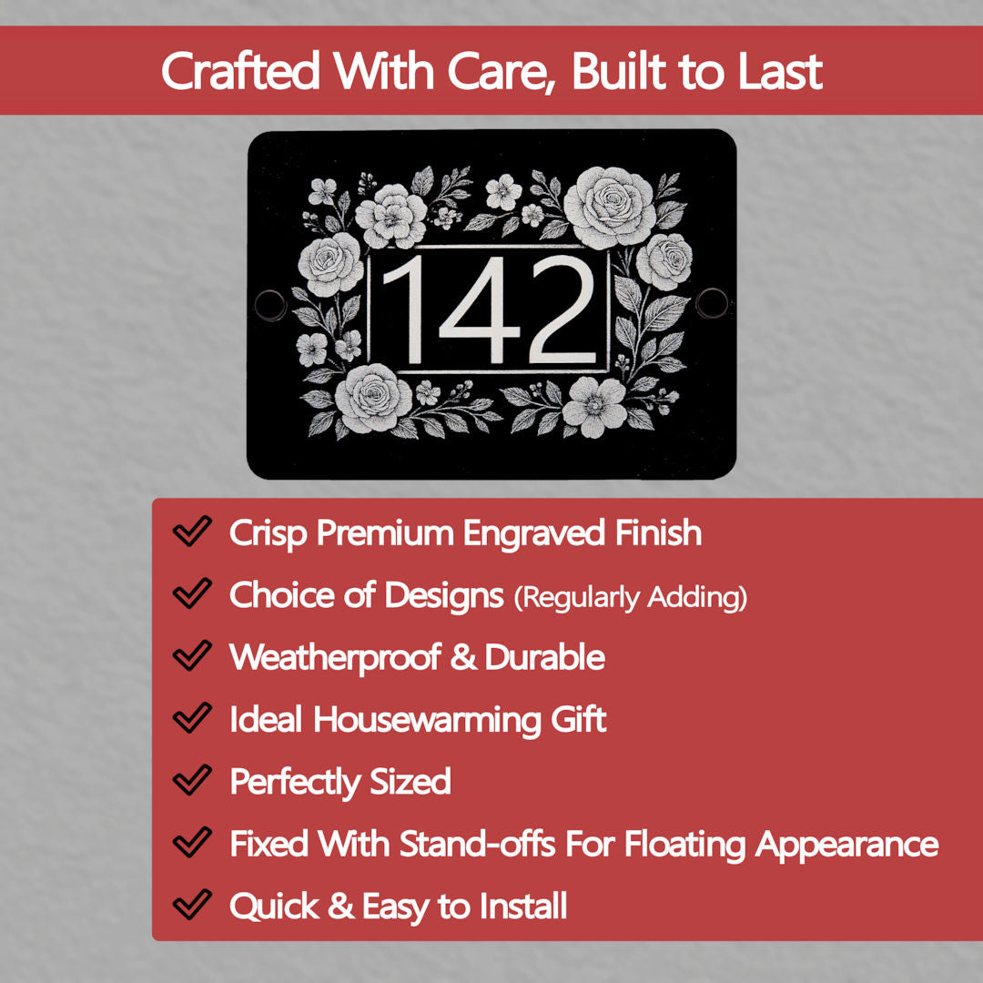 Decorative house number sign with floral design on a grey background with key features