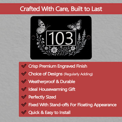 Decorative house number sign with butterflies and flowers on a grey background with text about product features.