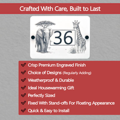 Decorative house number sign with elephant, giraffe illustration and feature list on a grey background.