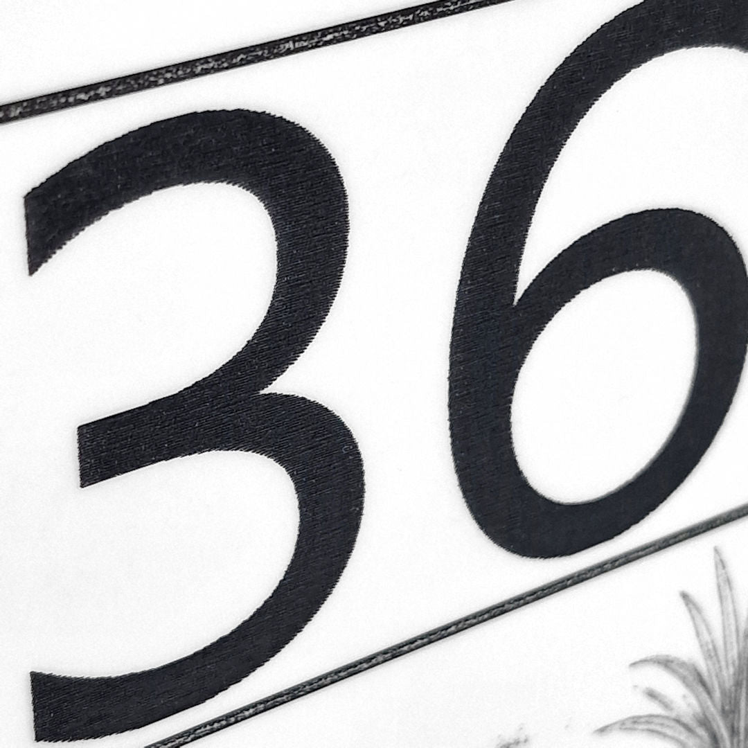 Safari Elephant and Giraffe House Number Sign – Laser Engraved Door Sign in White Acrylic - Close up of engraved numbers